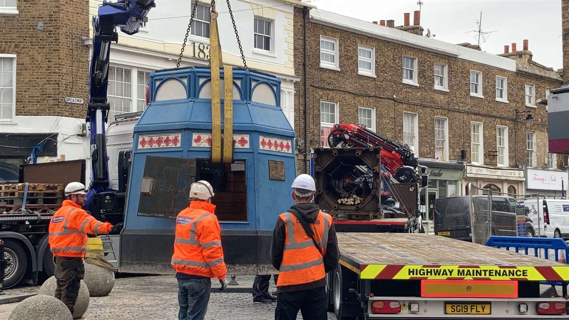 Day Four: The base of the Sheerness clock tower is craned onto a lorry ready to be taken away for restoration