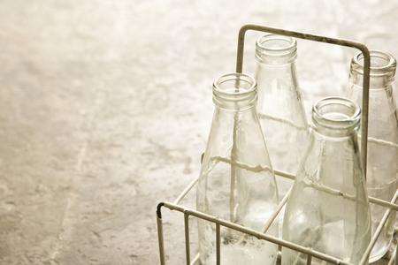 Milk bottles in a crate. Picture by Jupiterimages