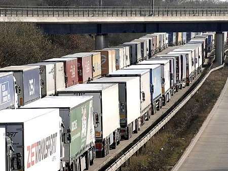 Lorries wait at junction 9 on the M20 on Thursday