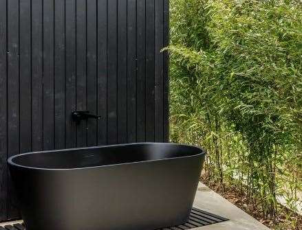 There's also a hidden outdoor bathtub and shower. Picture: The Modern House