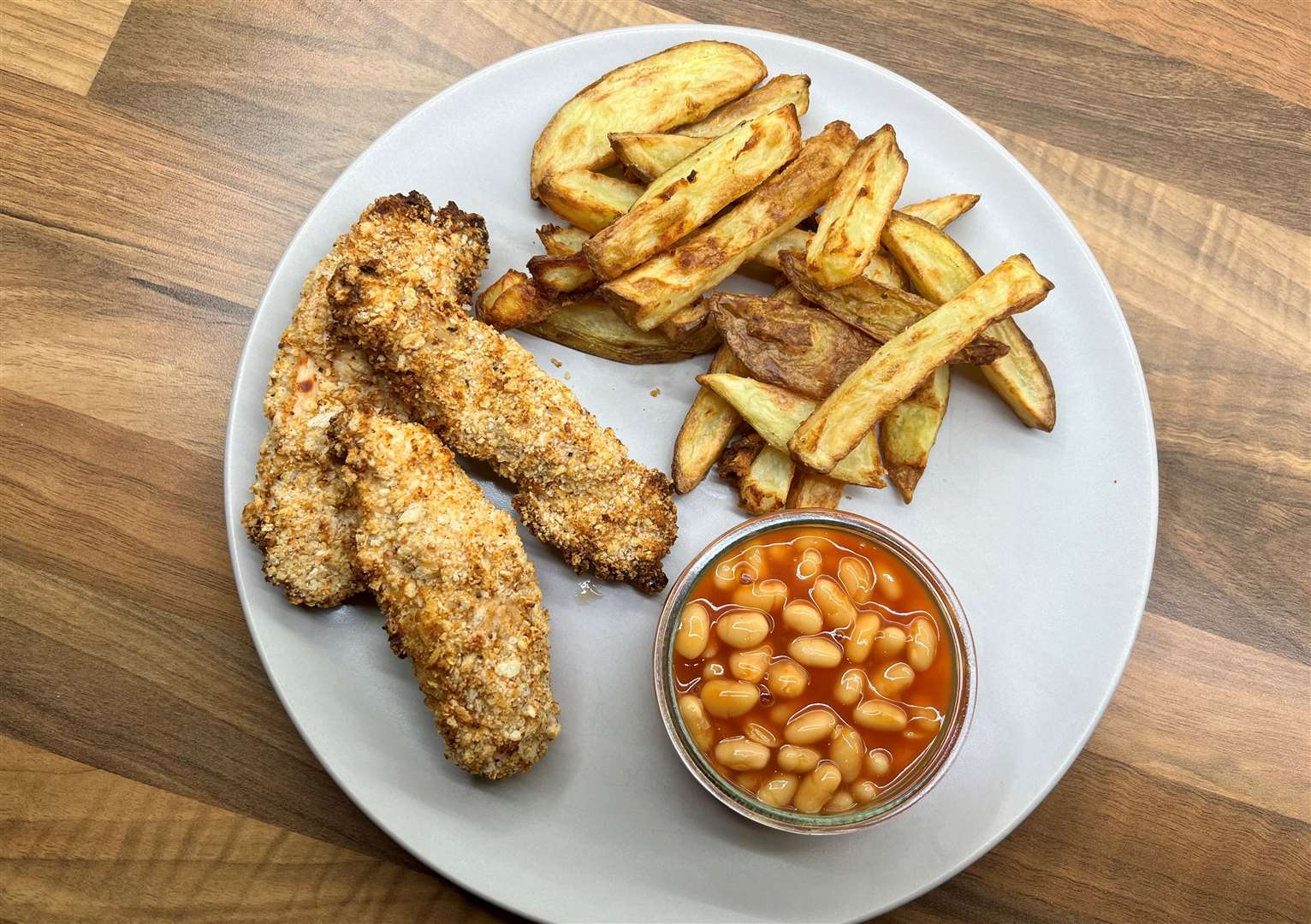 Chantal's healthy take on a KFC included homemade chips and beans alongside her chicken