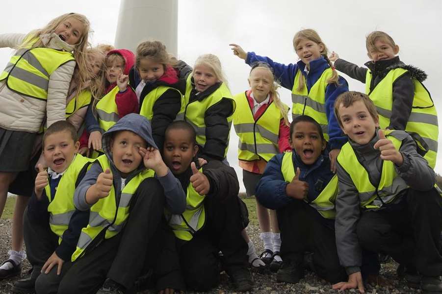Year 2 children from Eastchurch Primary School visit the wind turbines at the Sheppey Prison Cluster, Eastchurch, to learn about renewable energy