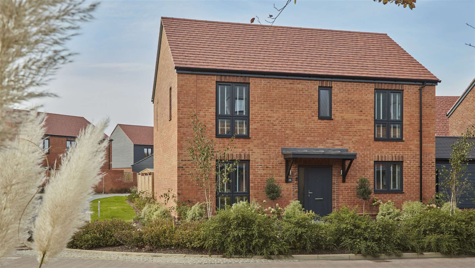 A street scene at Bellway’s Blenheim Green development in Kings Hill, where the housebuilder is offering buyers a £25,000 cashback incentive on selected homes purchased in January 2024.