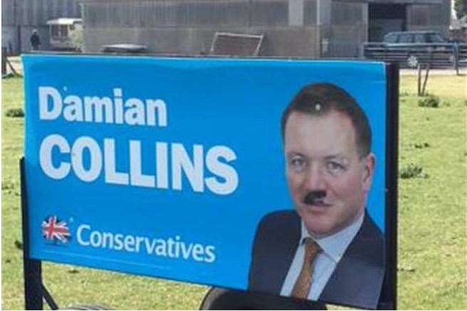 The Damian Collins poster has been defaced in New Romney