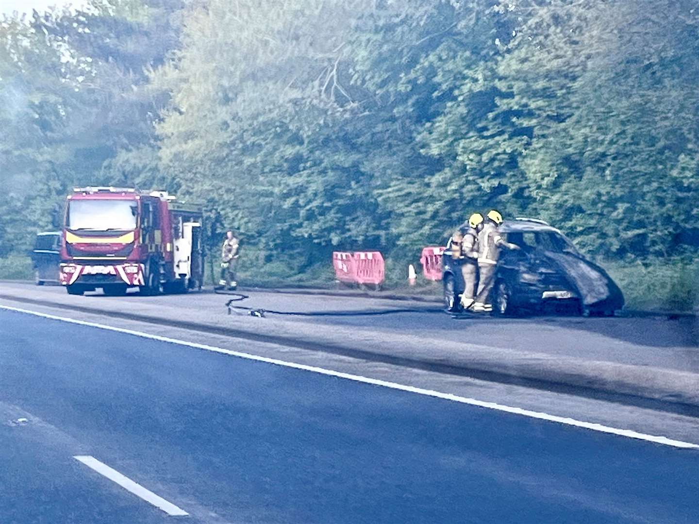Fire crews were called to a car alight on the A28 Great Chart in Ashford. Photo: Steve Salter