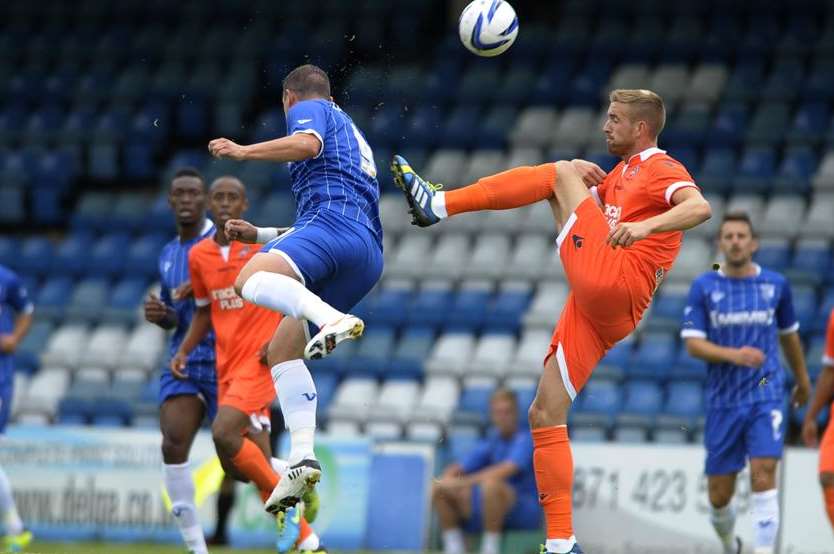 Gillingham striker Danny Kedwell in the thick of the action against Millwall on Saturday. Picture: Barry Goodwin