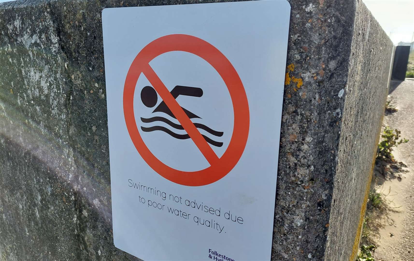 A sign warning people not to swim at St Mary’s Bay
