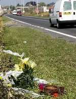 Floral tributes left at the spot where he was struck in August 2005. Picture: JOHN WARDLEY
