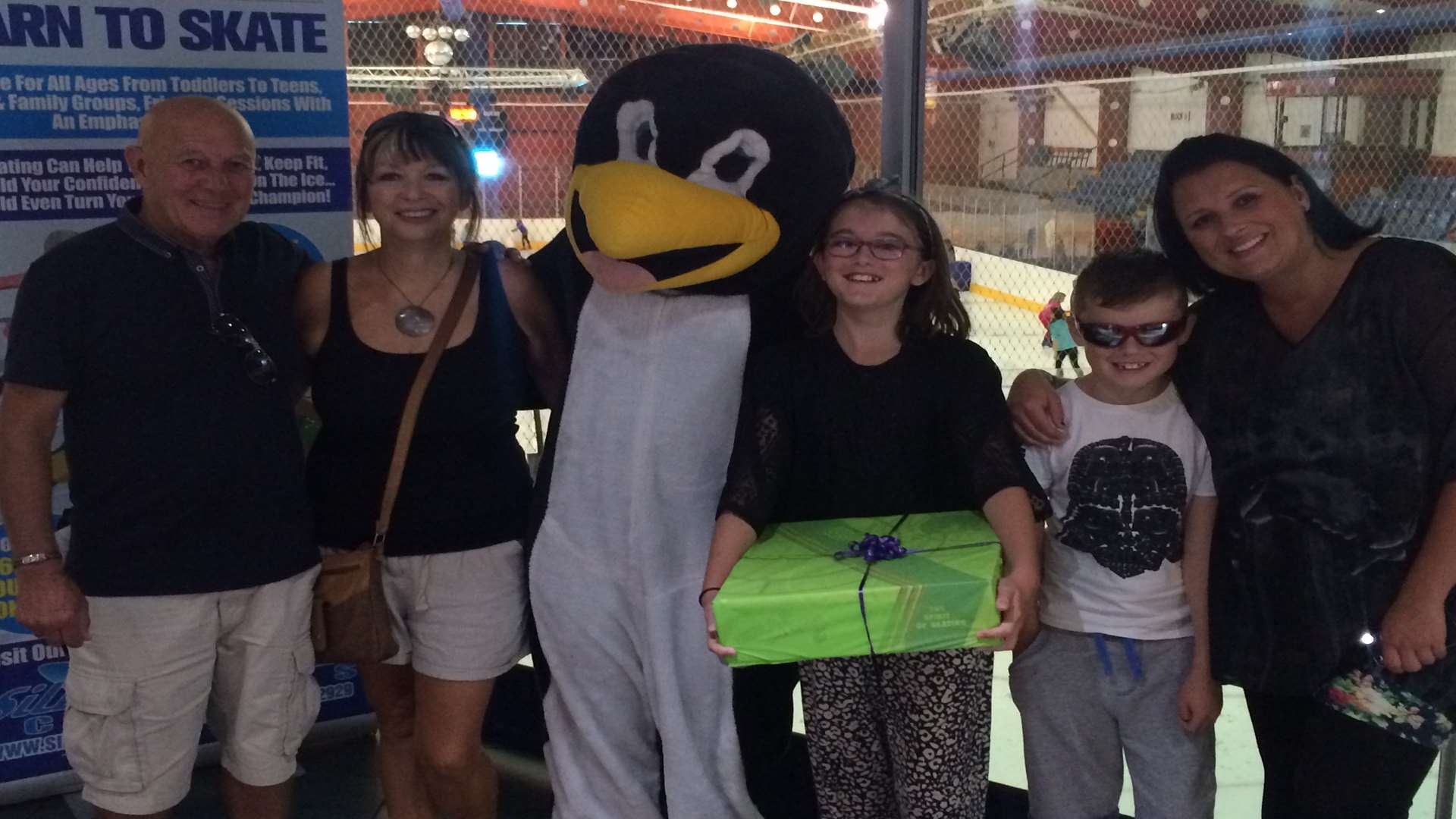 Lucy Studd and family meet Percy the penguin, mascot of Silver Blades ice rink.