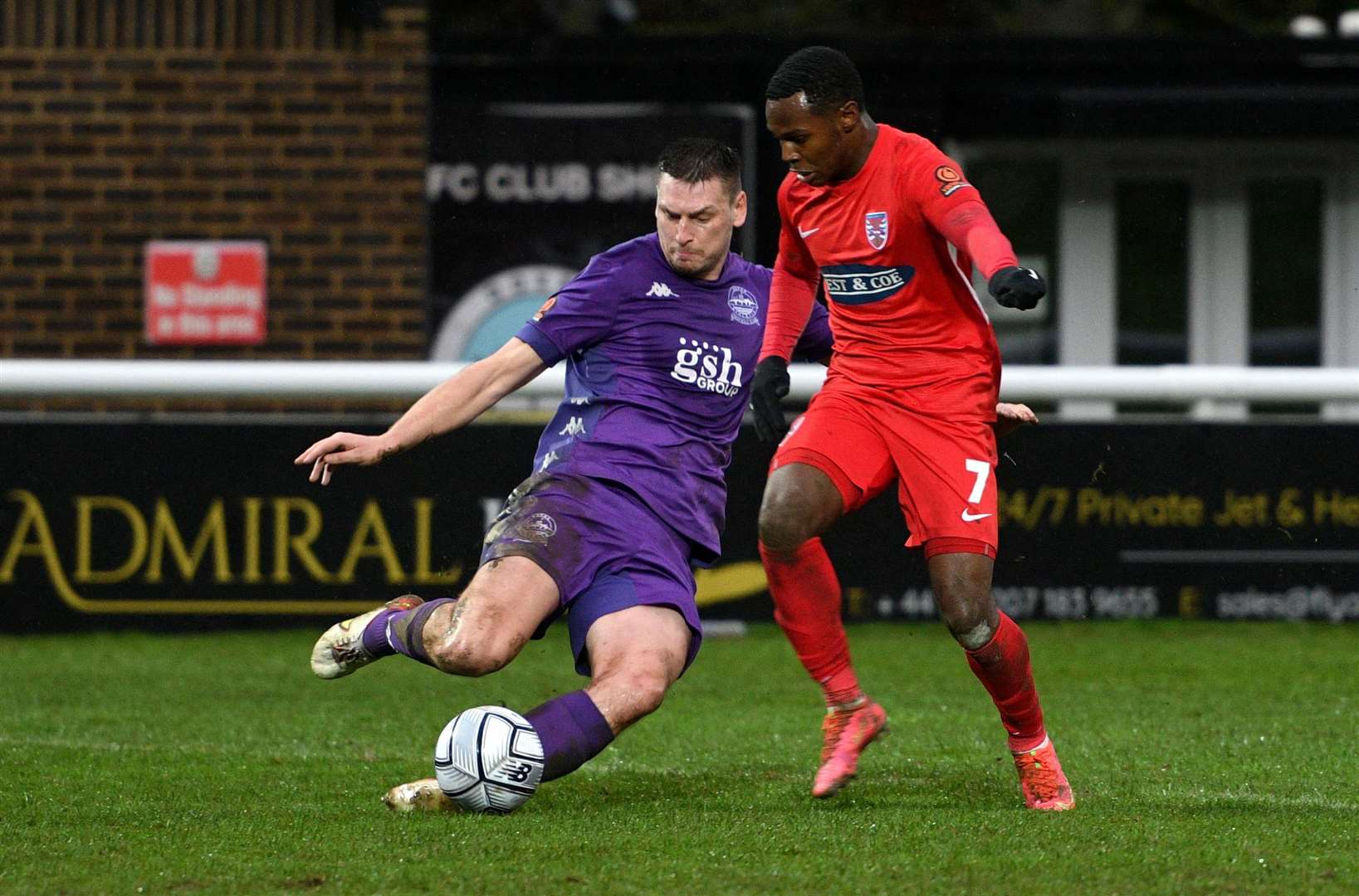 Dover’s Jake Goodman, left, made his return from injury against Farnborough, only to damage his hamstring. Picture: Barry Goodwin