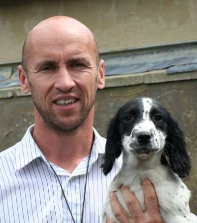 Christopher Burns with one of the missing dogs, Herby.