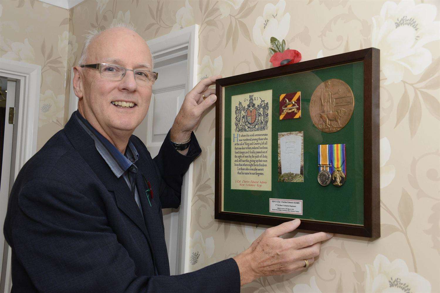 Nigel Adams with his great uncle's medals. Picture: Paul Amos