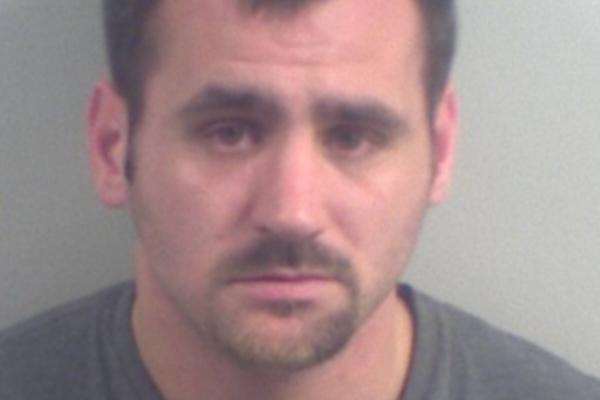 Thug Phillip Tullett has been jailed for raiding a pizza store