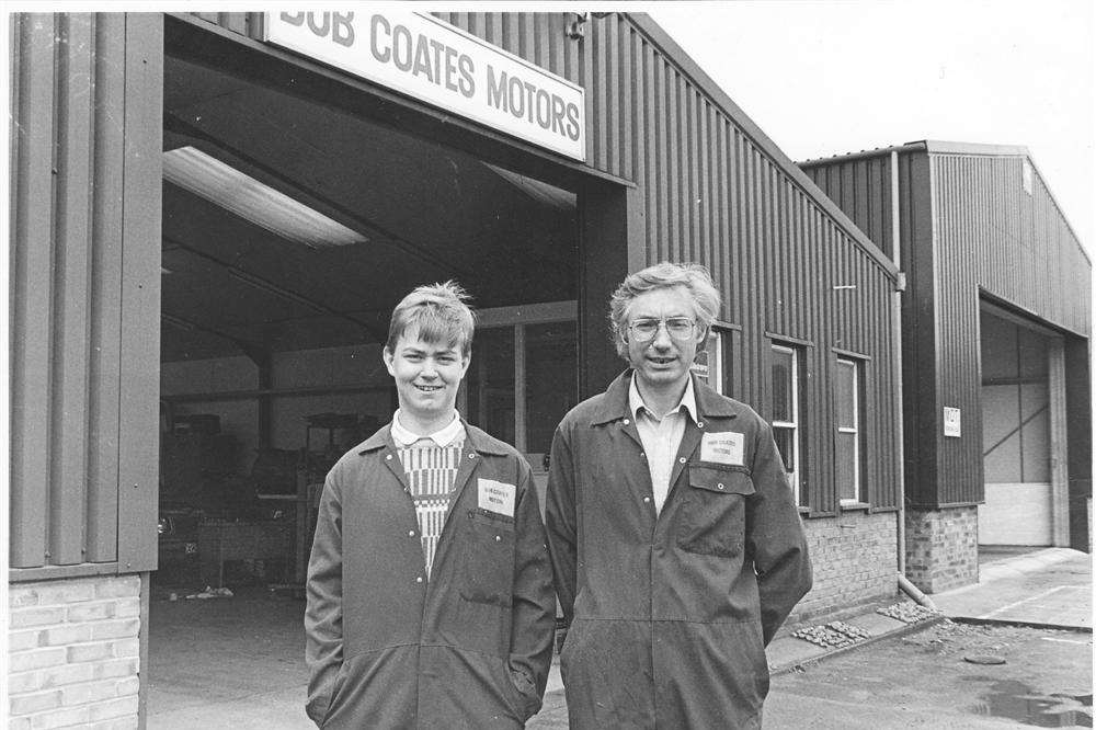 Peter and Bob Coates outside the garage in 1986
