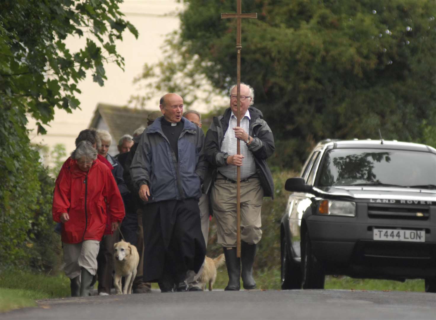 Canon Norman Woods leads a group on an annual pilgrimage to the site of the former church in Chapel Down, Tenterden. Picture: Martin Apps
