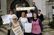 Protesters against care home closures at county hall