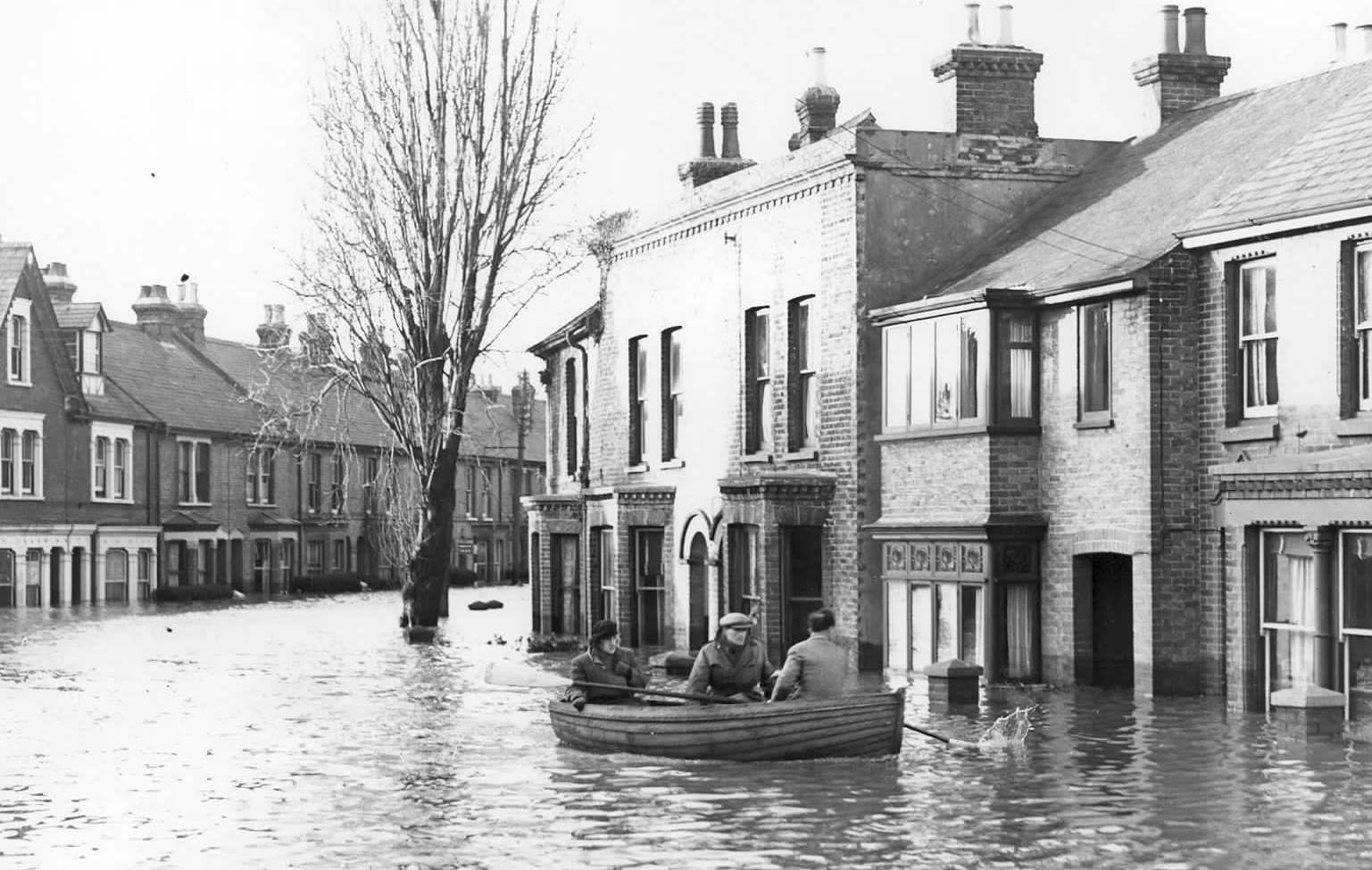 Whitstable was badly hit in the 1953 flood – here residents of Nelson Road are forced to take to a boat from their homes