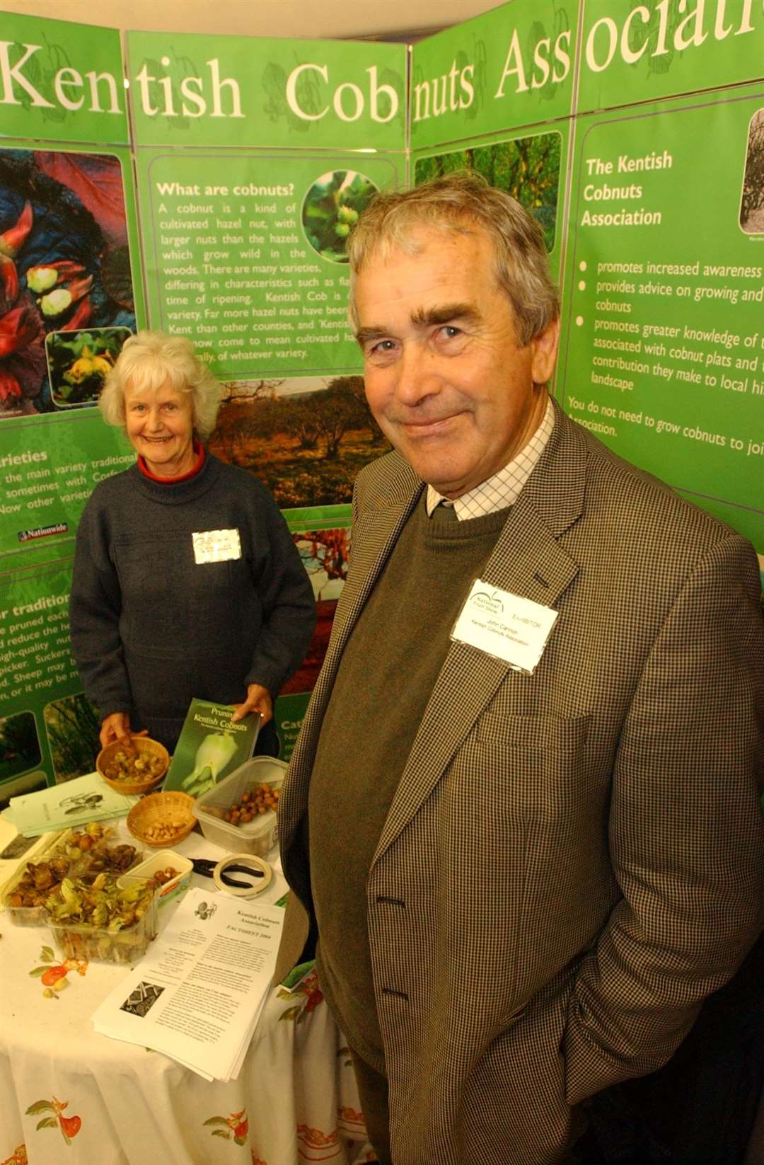 John Cannon exhibiting at the National Fruit Show in 2004, with Vivien Gainsborough, then secretary of the Kentish Cobnuts Association