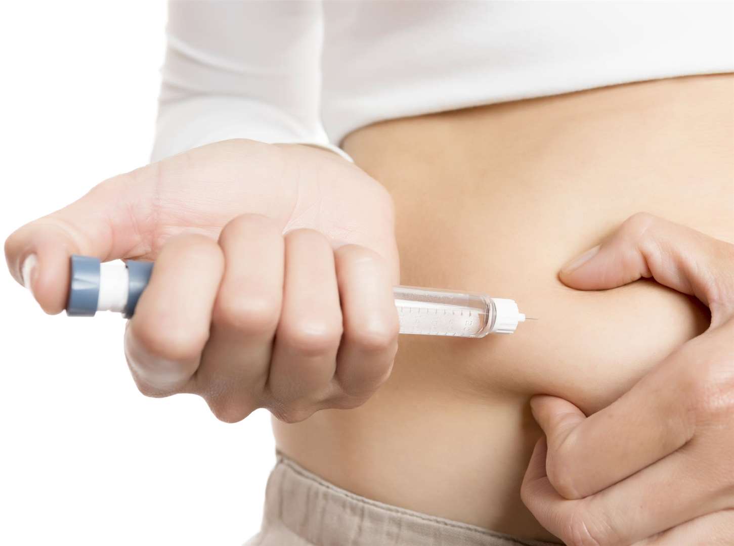 Woman with diabetes injects insulin. Stock picture