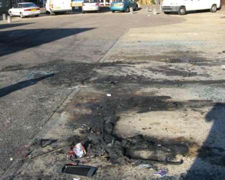 The scene where three cars were set alight