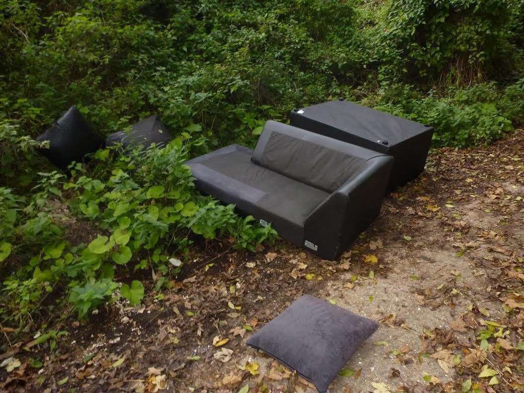 A sofa left at the side of the road