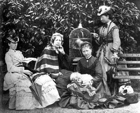 The Ternan family, from left, Nelly's sister Fanny, her mother Frances, Nelly with the pet dog and sister Maria.