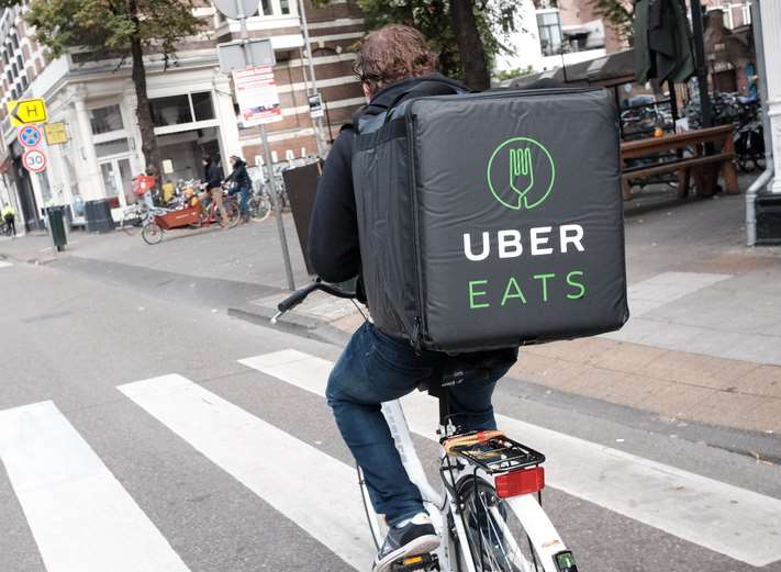 An UberEATS delivery cyclist