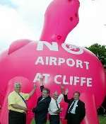 THEY'VE GOT THEIR WAY: Medway Council leaders posing with a giant anti-Cliffe Airport pig in September