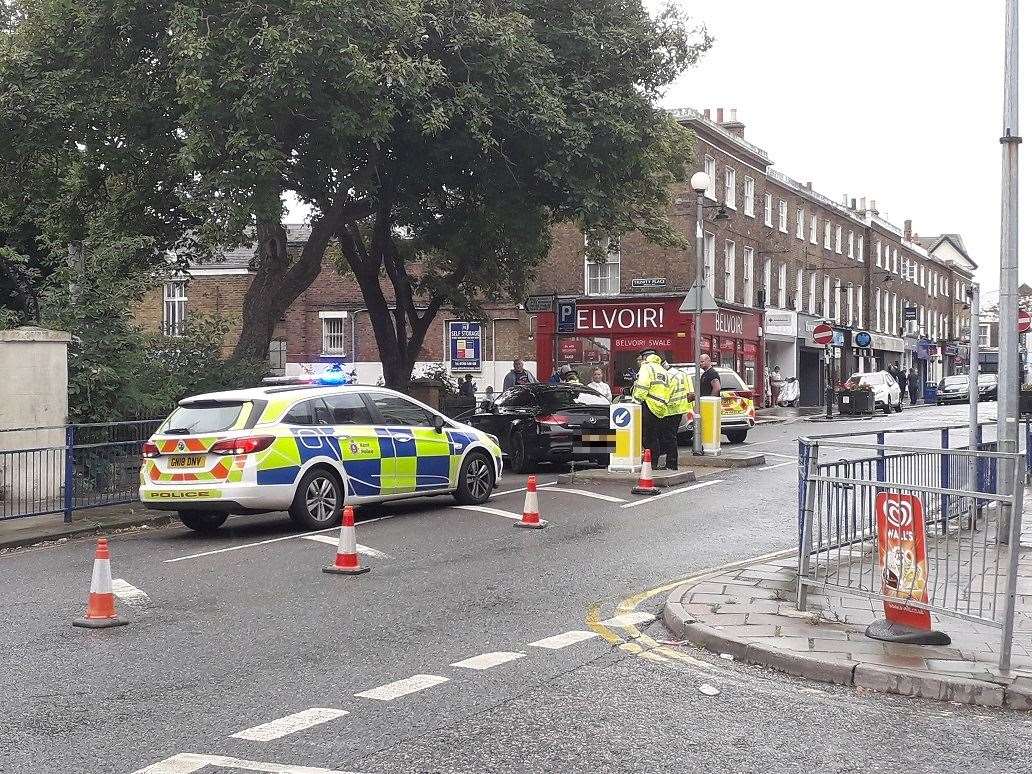 Police cars around a black Mercedes outside Holy Trinity Church, Sheerness, on Wednesday. Picture: Phil Crowder (15217947)