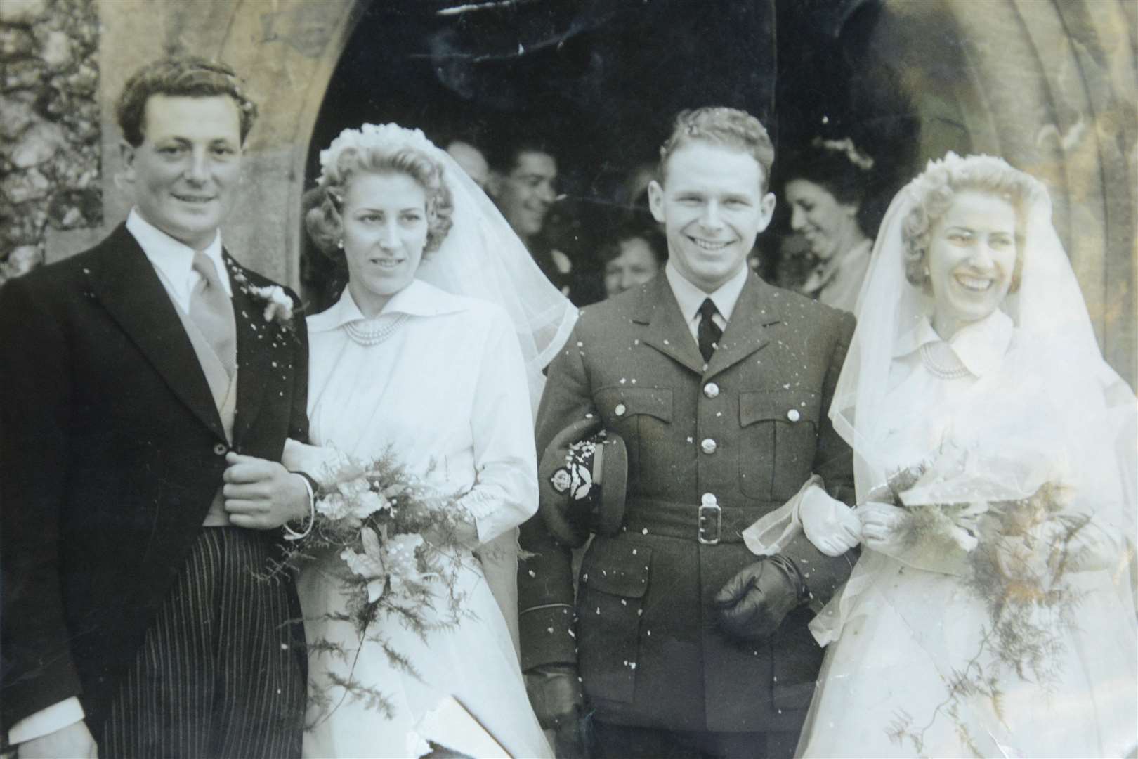 Jackie and Jill on their wedding day with husbands Ronald Upton and John White