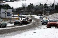Motorists struggle in the snow at Hawkinge, near Folkestone. Picture Terry Scott