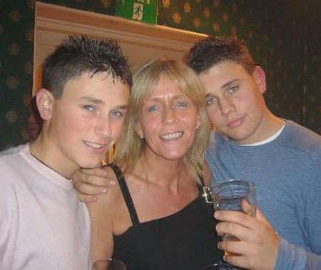 Robert Knox (right) with his mother Sally and younger brother Jamie