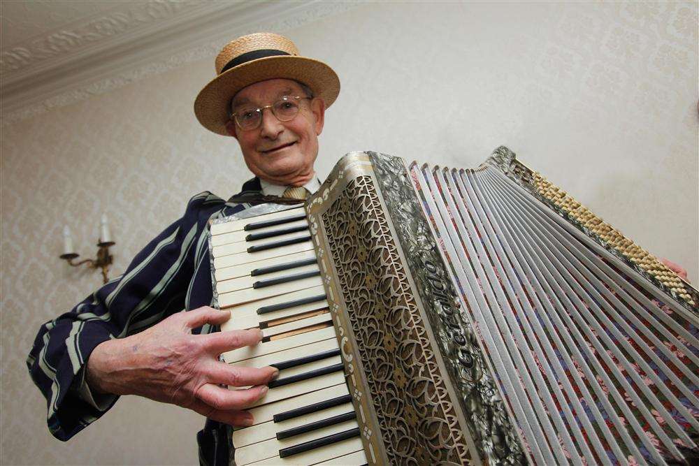Peter Morgan playing piano accordion. It was on offer to anyone who wanted it.
