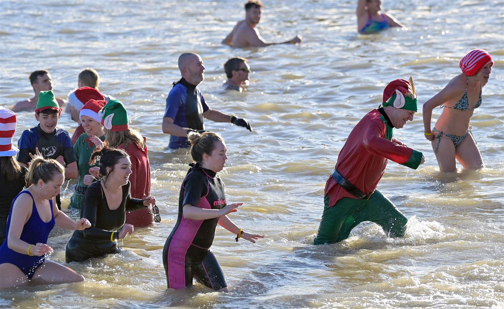 People taking part in the traditional Boxing Day swim in Deal