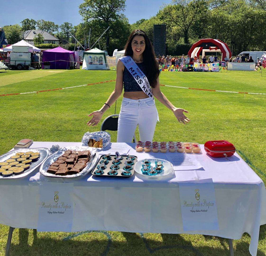 Neha Dhull selling baked cakes for charity. (2427449)