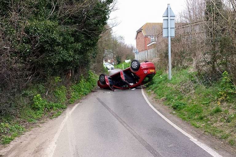 Police were called out to an overturned car in Landseer Avenue, Gravesend. Picture: Roger Kasper