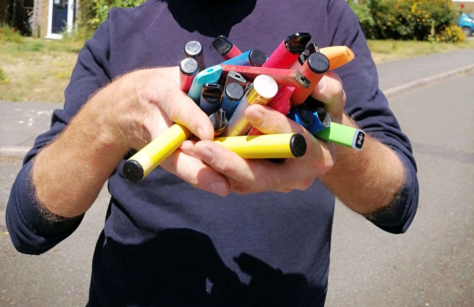 Tony Harwood with some of the many disposable vapes found on his litter picks