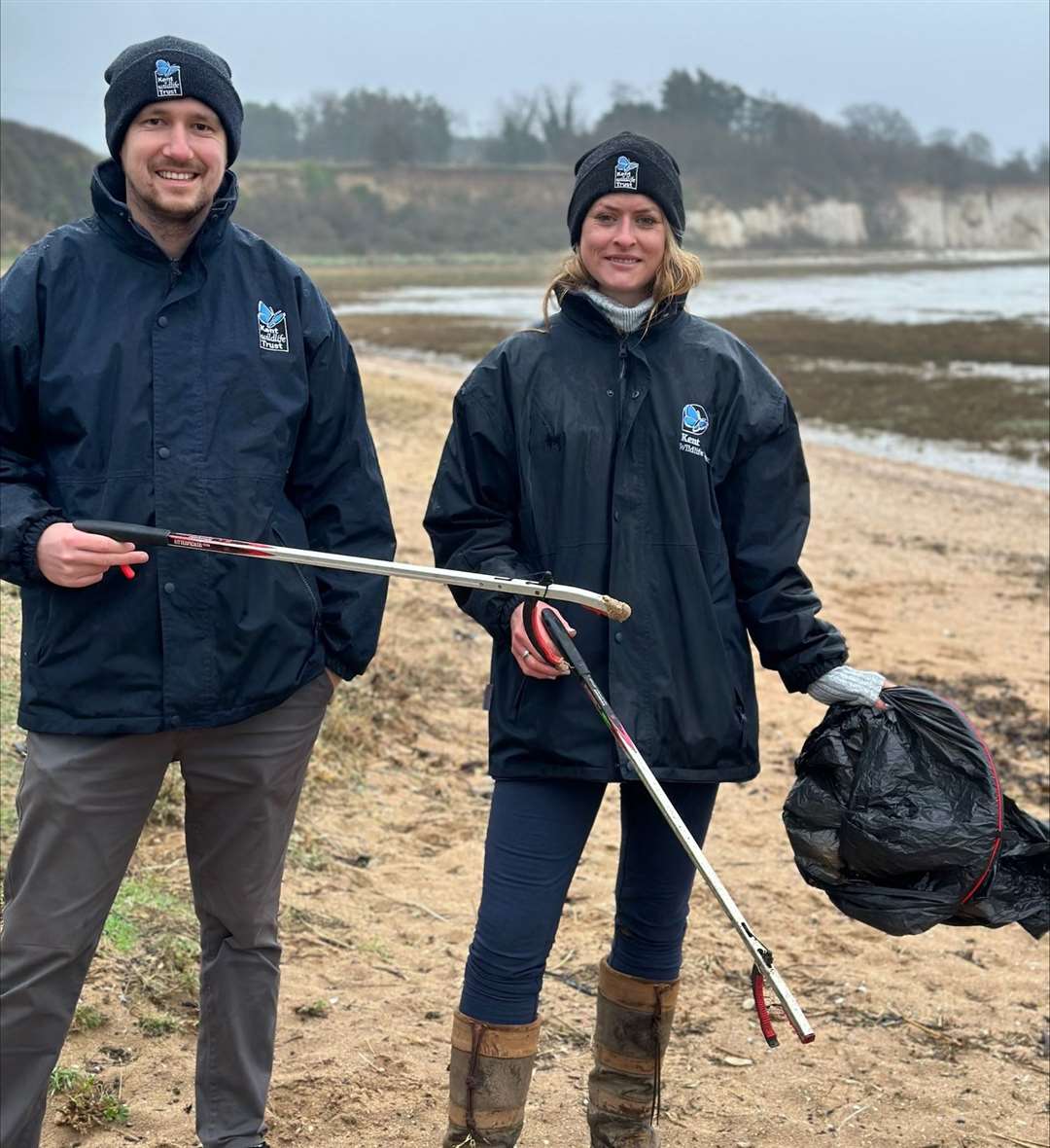 Tom White and Nina Jones, from the Wildlife Trust, clean Pegwell Bay. Picture: Kent Wildlife Trust