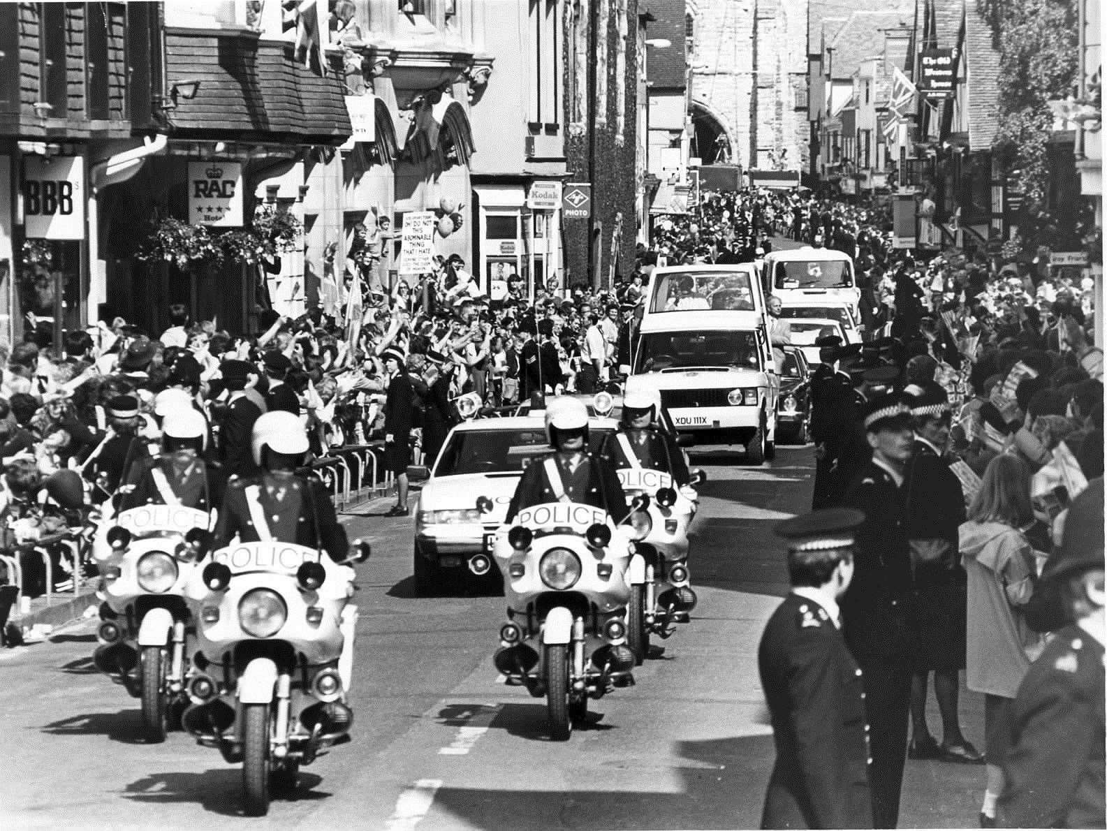 Crowds in their thousands lined the streets of Canterbury to greet the Pope, who travelled in his Popemobile in May 1982