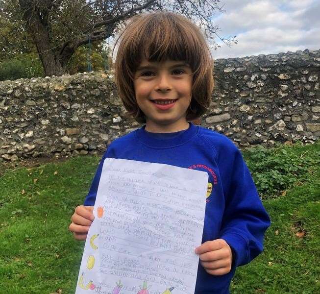 Bruno Serrano, six, with his letter. Picture: Ruth Linklater