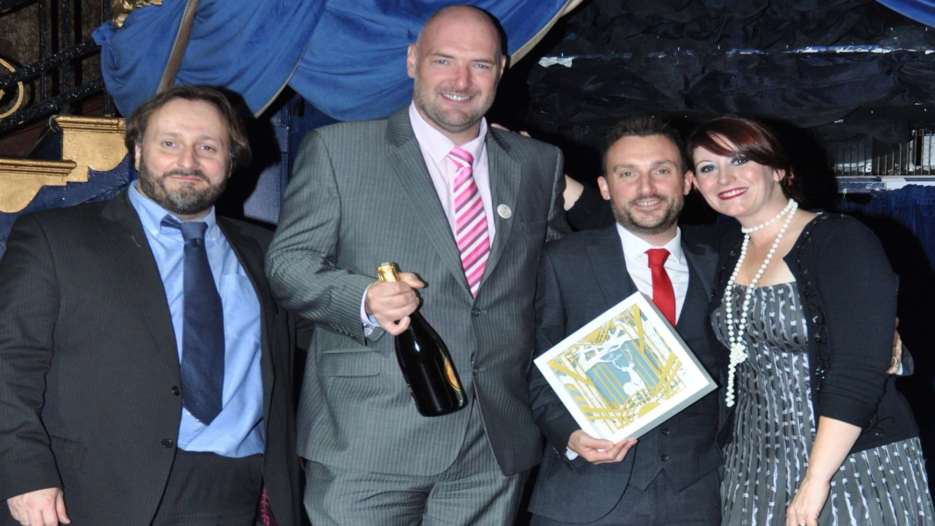 Picking up the award, from left, Earth Island Publishing managing director David Gamage, Bridge Media managing director Phil Mayne, Bridge Media group operations director Nik Hersey-Walker and Louise Gamage of Earth Island Publishing