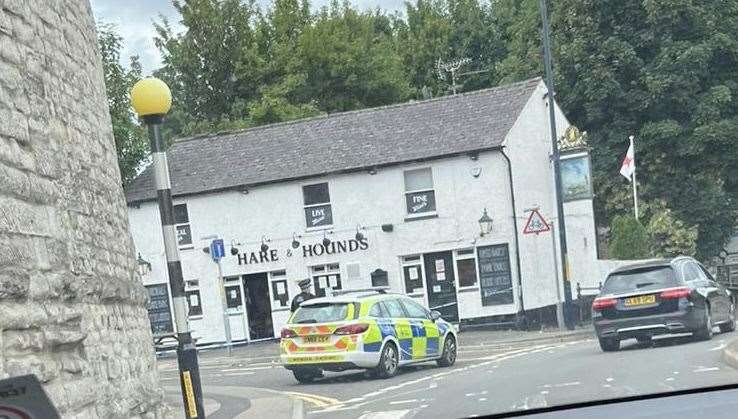 Police cordoned off the scene outside the Hare & Hounds pub in Maidstone