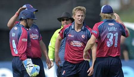 Adam Ball celebrates a wicket with Spitfires team-mates