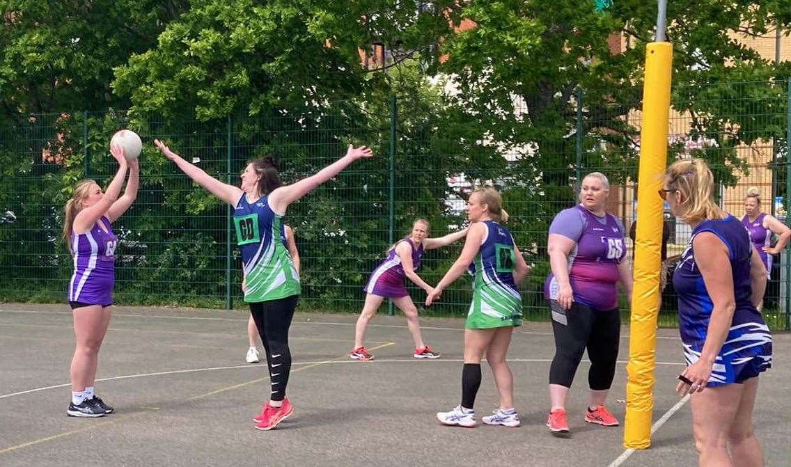 Pick n Mix take on Sandhawk Sabres in the Ashford Netball League's summer tournament. Picture: Terrie Ireland