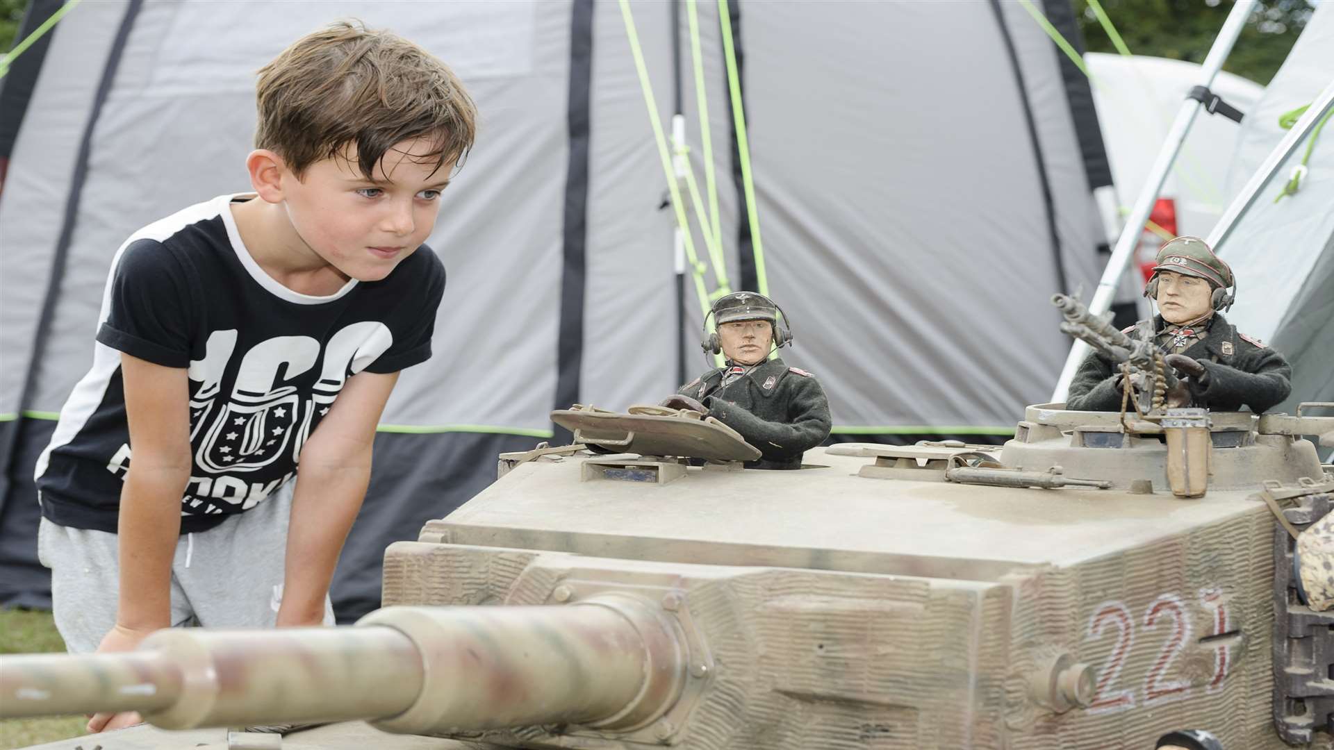 Buddy Ramshaw, six, takes a look at a model Tiger tank at the Southern Model Show Picture: Andy Payton