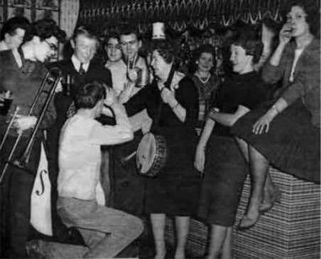 A band plays at the Cedars. Doris Stagg proprietor, is pictured with Shirley the barmaid