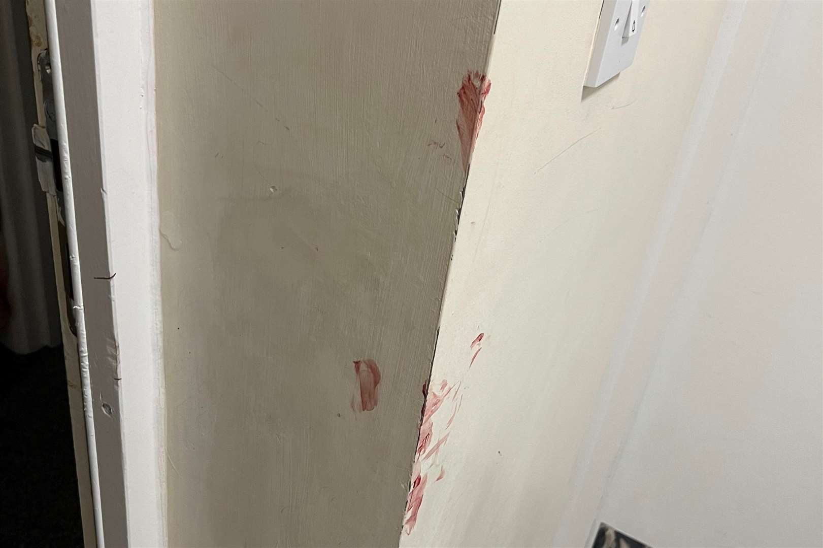 The blood-stained wall outside Rachael Jane's flat