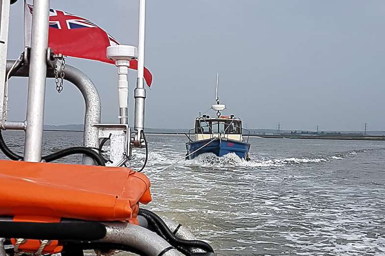 Angling boat in tow in the Swale. Picture: RNLI