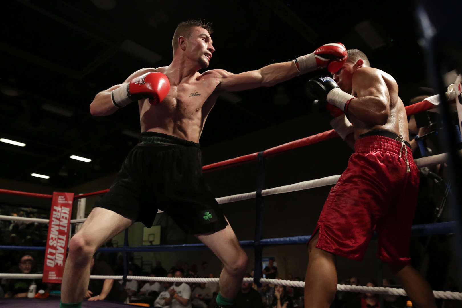 Louis Greene (black) Vs Geiboord Omier (red) in a super lightweight bout. Picture: Countrywide Photographic