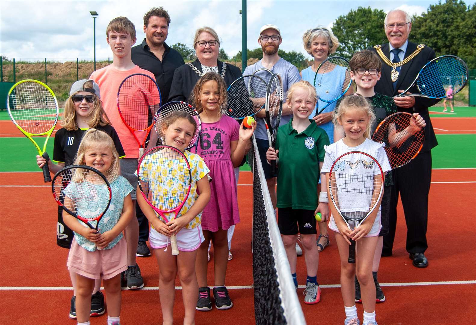 Youngsters at Herne Bay Tennis Club alongside (back row, from left) Mark Quinn, Lady Mayoress Dr Elizabeth McGowan, Guy Farmer, Isobel Warnock, Lord Mayor Pat Todd